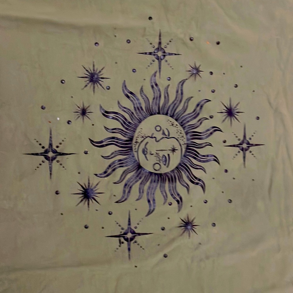 Green t-shirt with sun